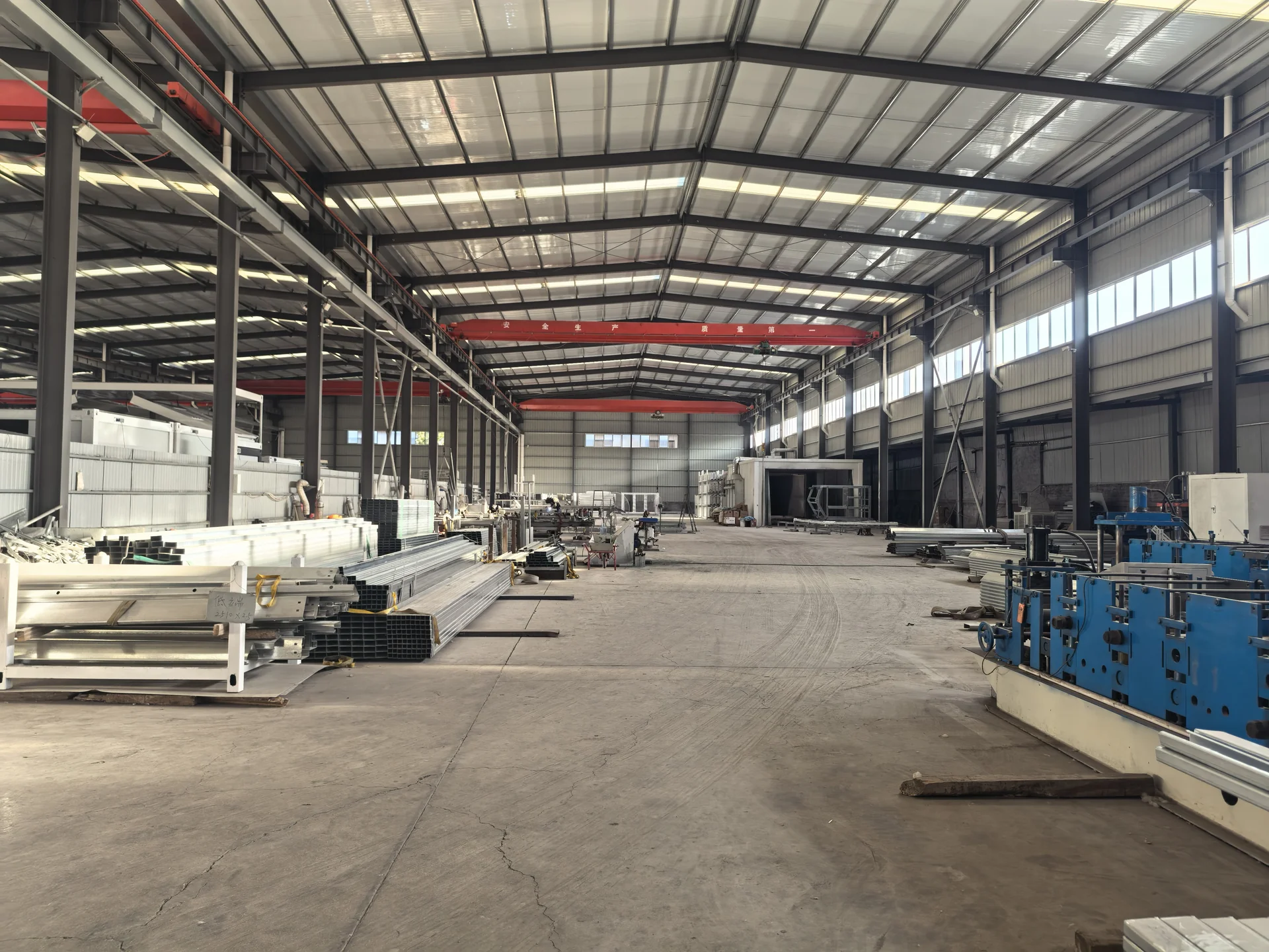 Workshop showing steel components and production machinery