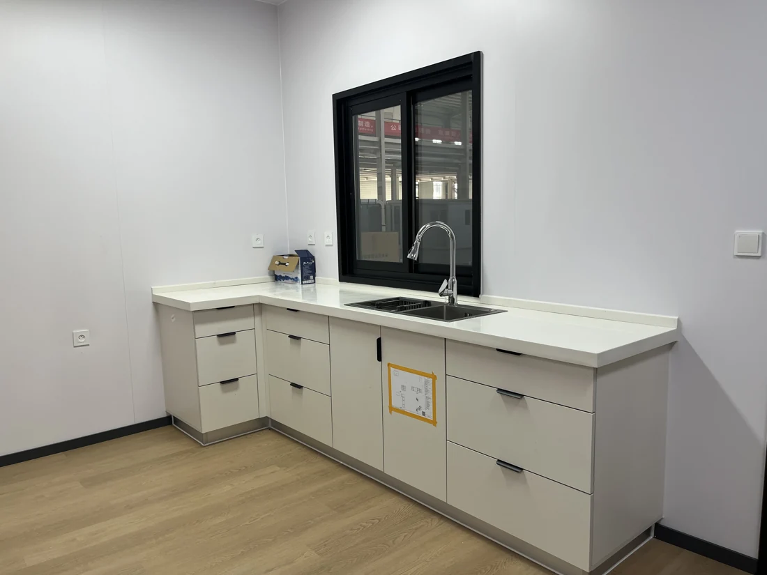 Kitchen fittings inside a modular unit