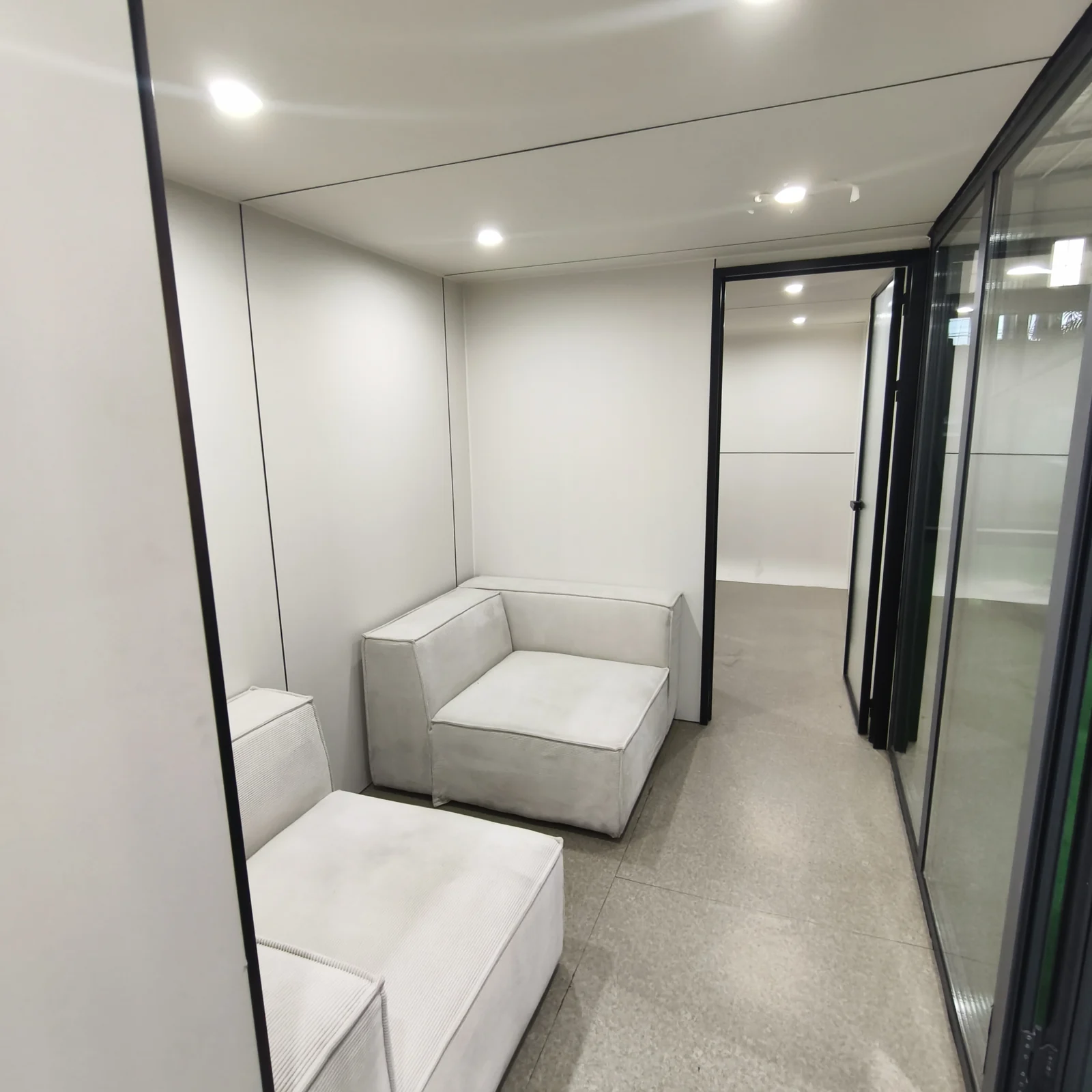 White facade Apple Cabin interior